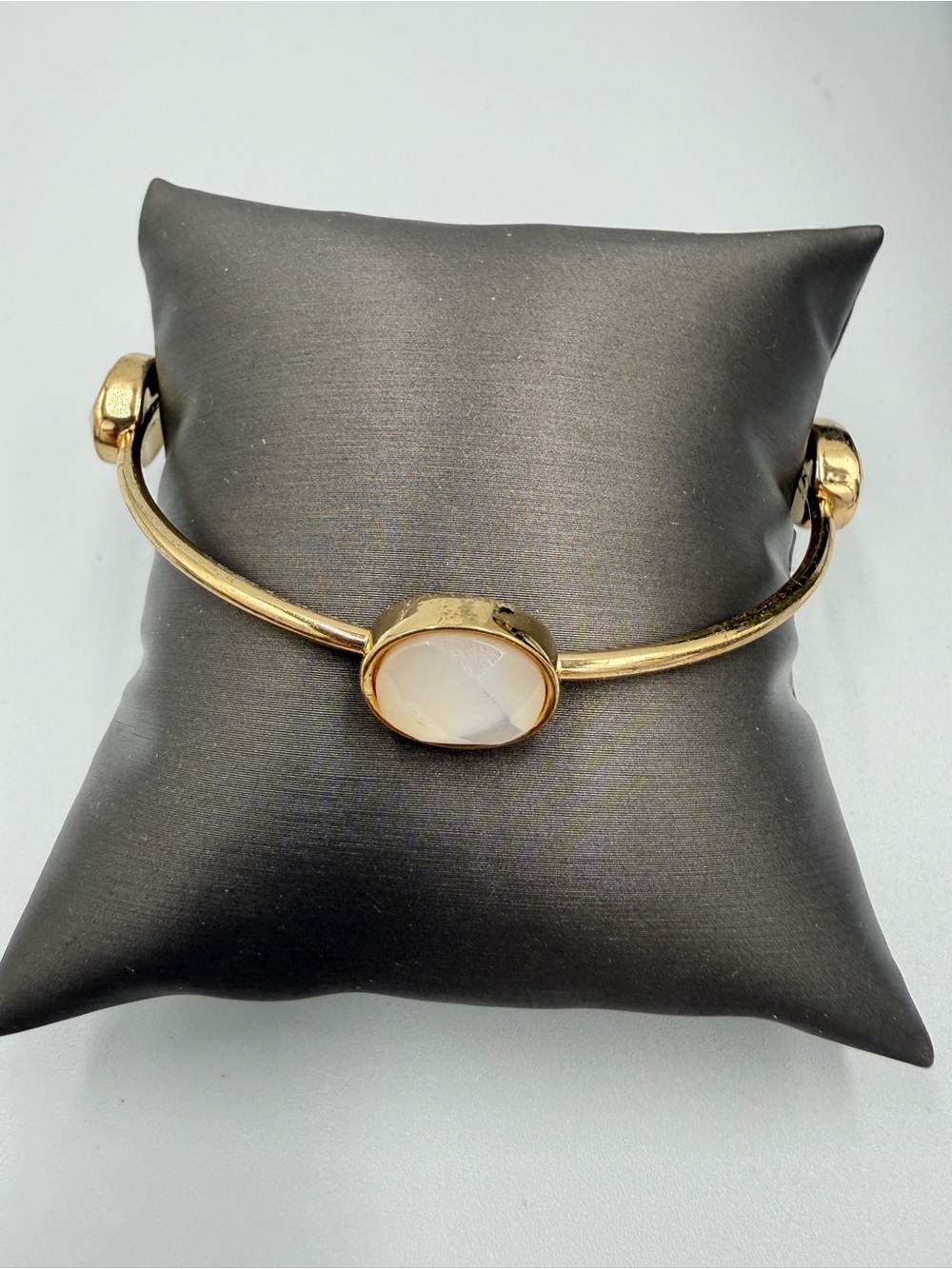 Gold-Tone Cuff Bracelet with White Oval Stone